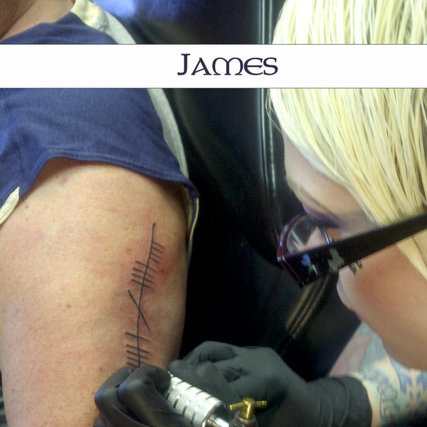 Ogham Tattoo outside arm