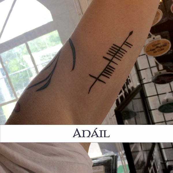 Ogham Tattoo inside arm
